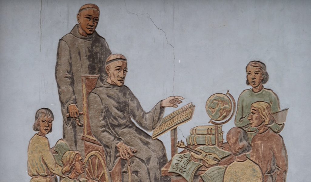 Illustration of Hermann of Reichenau (Hermannus Contractus), an 11th-century monk who used a wheelchair-like device, composing music and teaching students, with the 'Salve Regina' manuscript visible.